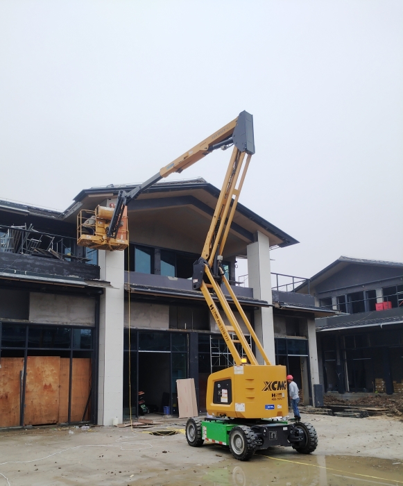 绿色建造新标杆！皇冠welcome官网锂电高机助力鄂州民生工程